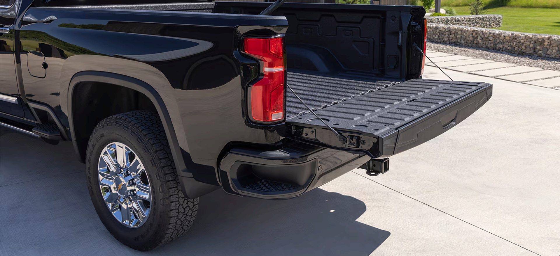 Black Chevrolet Silverado HD with the tailgate lowered to show the steel Durabed