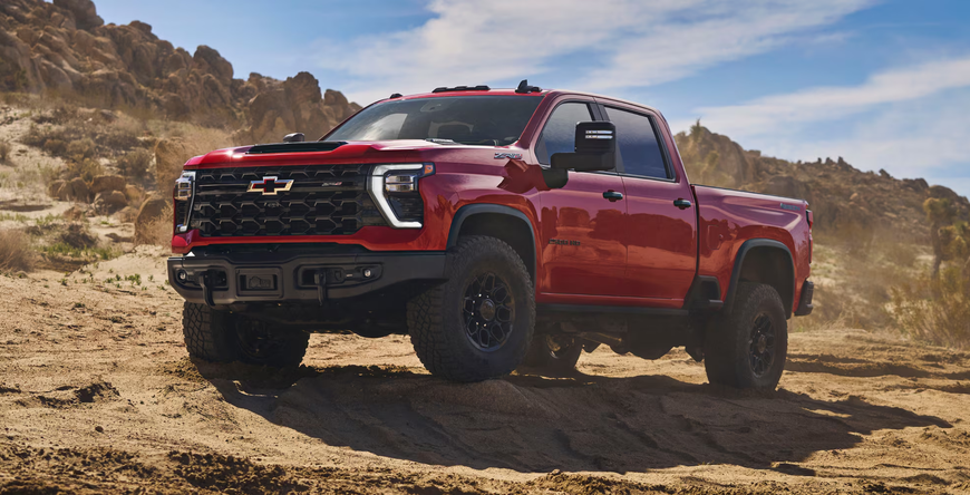 Red Chevrolet Silverado HD ZR2 Bison on rocky desert terrain