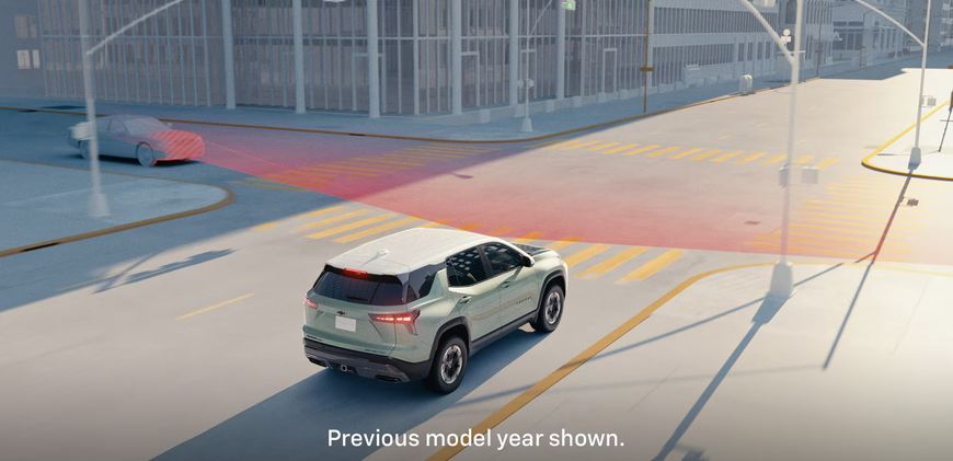 Chevrolet Equinox approaching a crosswalk with a highlighted pedestrian detection zone