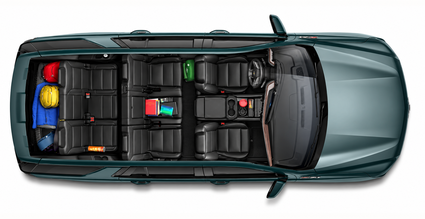 Overhead cutaway of a Chevrolet Tahoe with all three rows of seats and bags in the cargo area