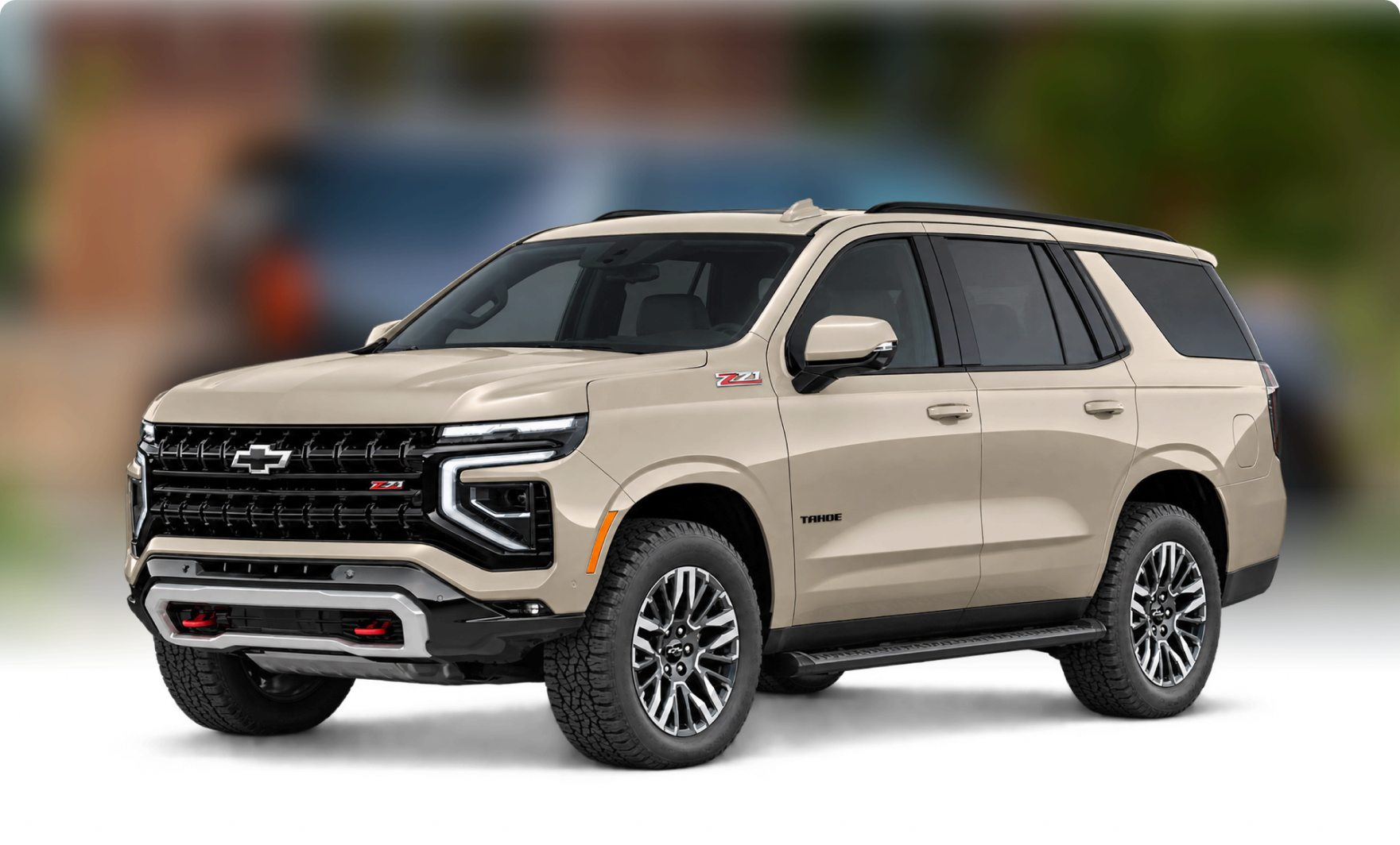 Sand-colored 2027 Chevrolet Tahoe Z71 in front of a blurred city street