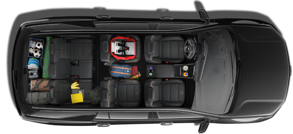 Overhead cutaway of a Chevrolet Traverse with backpacks, sports gear and a cooler