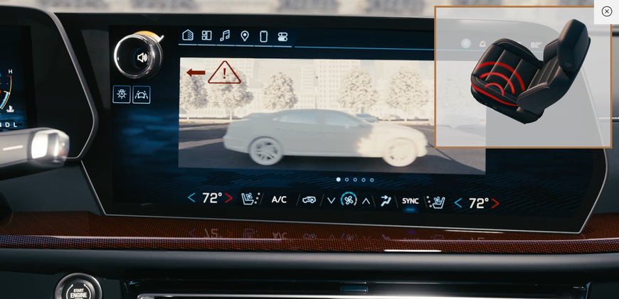 Chevrolet Traverse center display showing a Safety Alert Seat warning