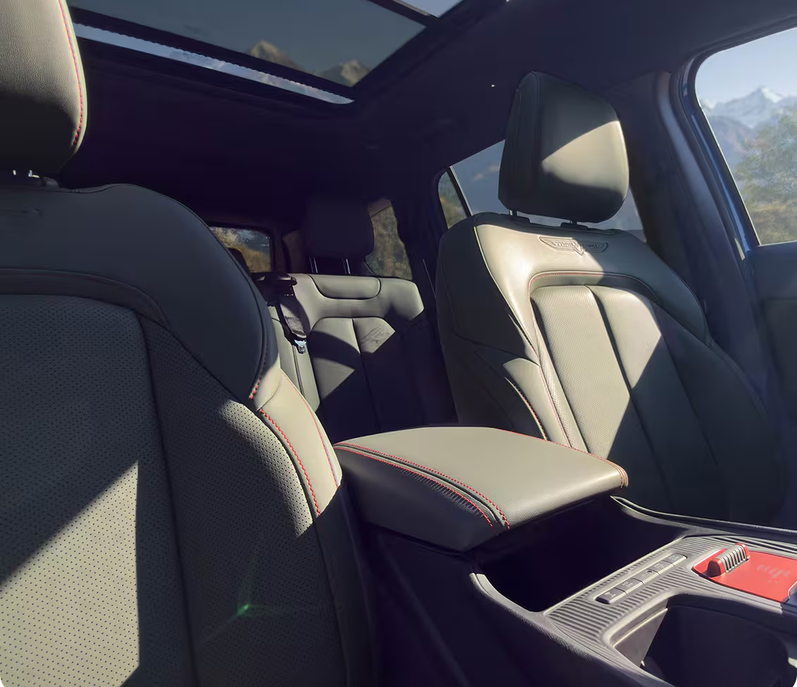 Black leather front seats of the 2027 Jeep Cherokee