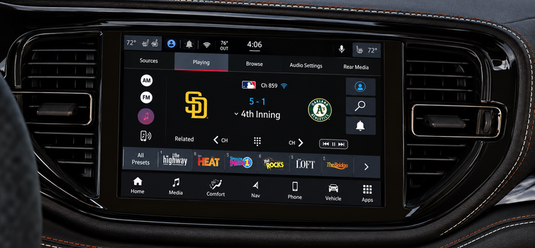 Uconnect touchscreen playing a SiriusXM sports broadcast