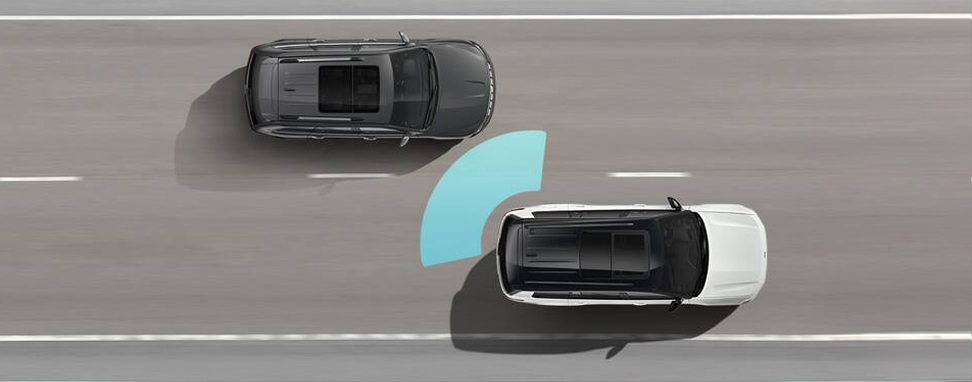 Overhead illustration of a Grand Cherokee sensing a vehicle in its blind spot