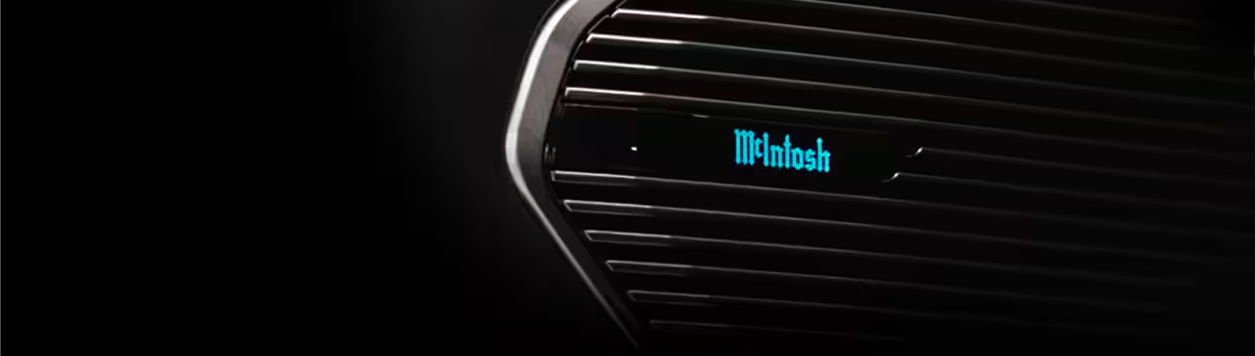 Illuminated McIntosh logo on a Grand Cherokee speaker grille